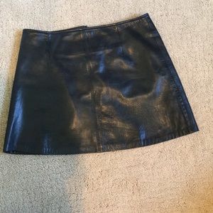 Black leather mini skirt